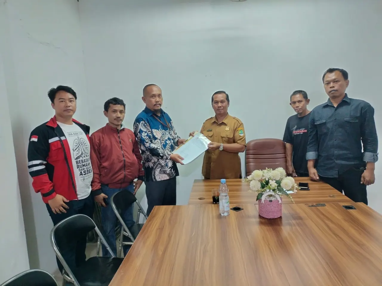 Mantan pekerja industri pengolahan bahan baku asbes.